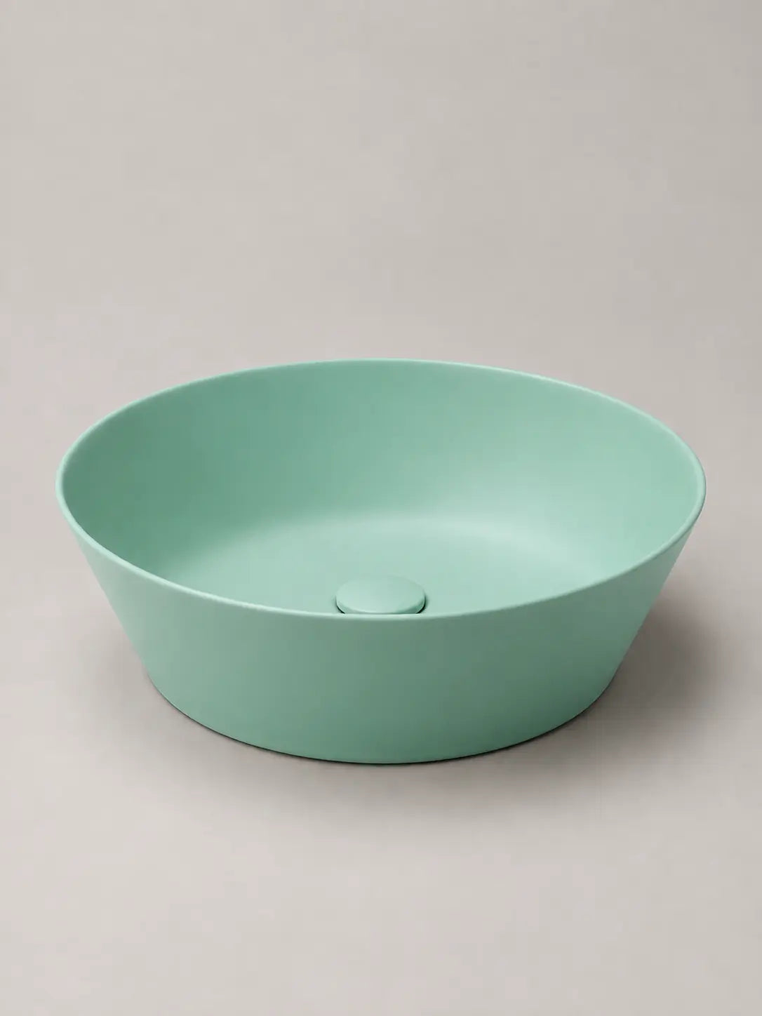 BBbidet 2603 matte green round ceramic countertop basin, studio product view