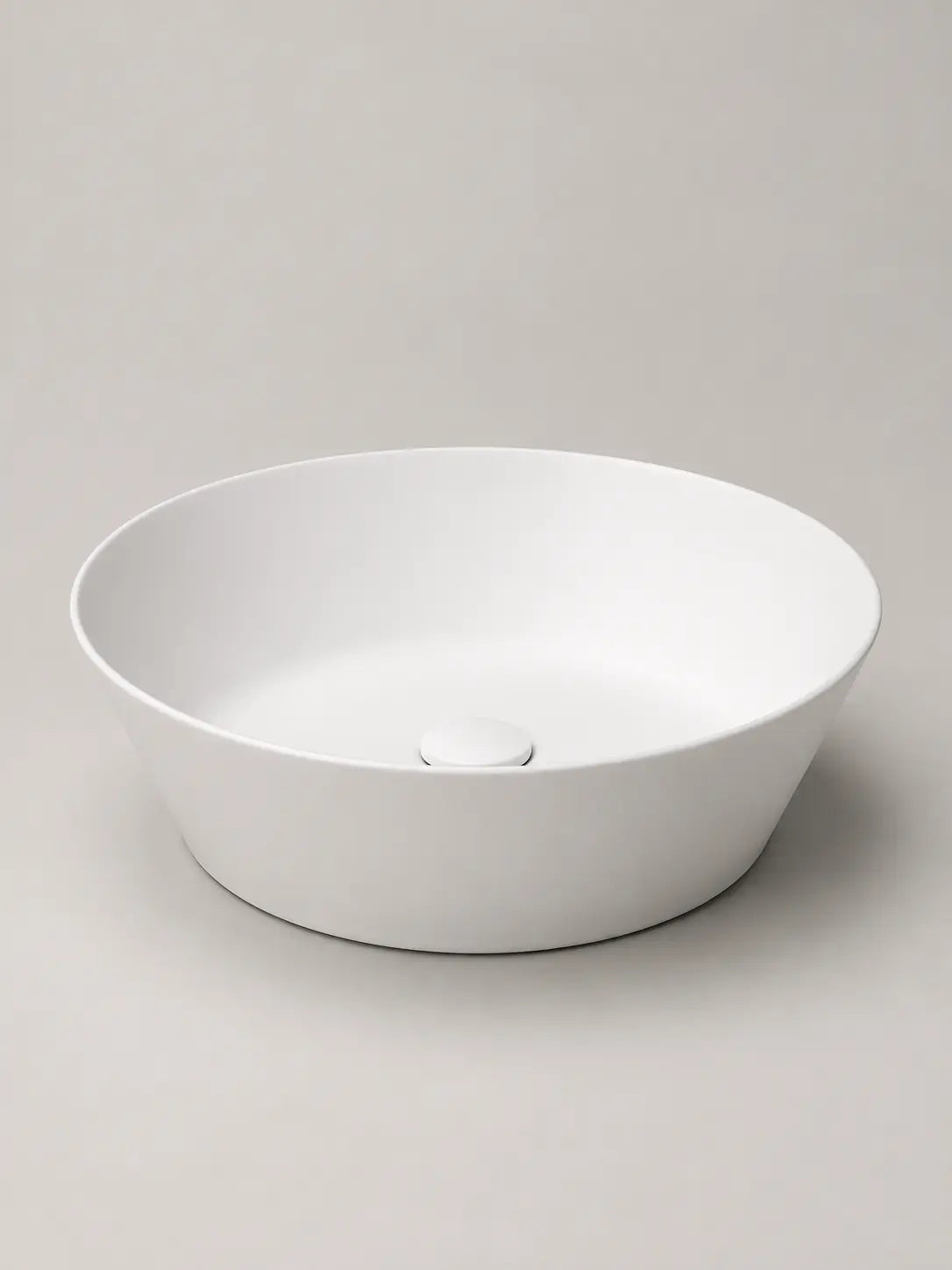 BBbidet 2603 matte white round ceramic countertop basin, studio product view