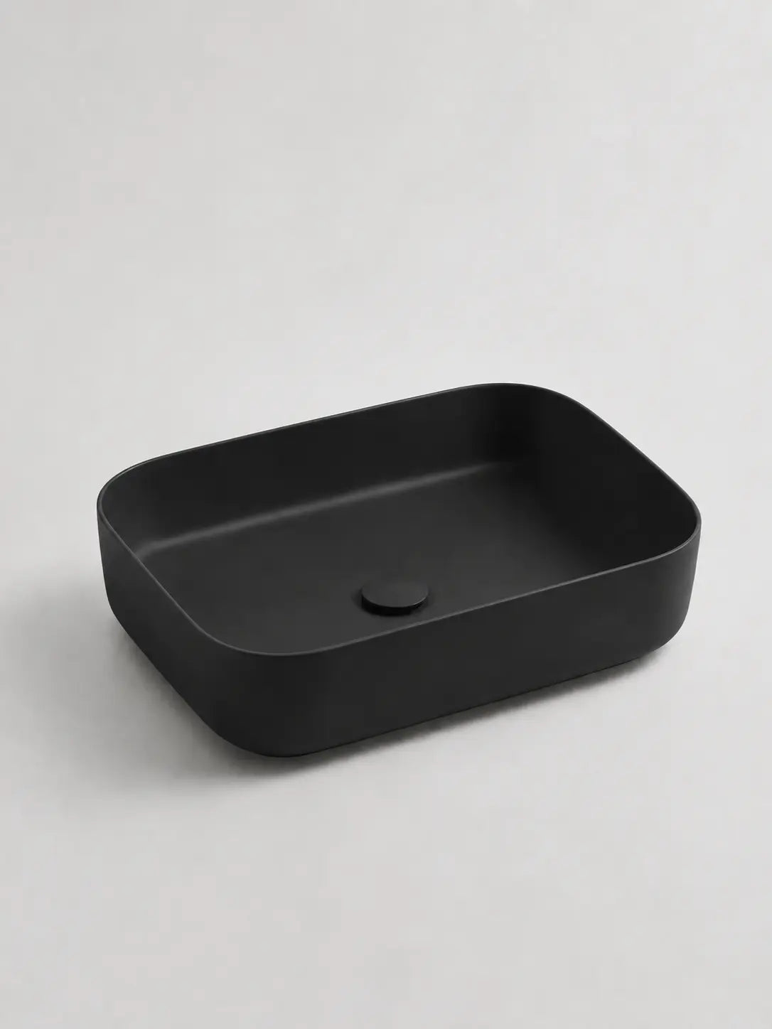 BBbidet 2608 matte black countertop basin studio profile view