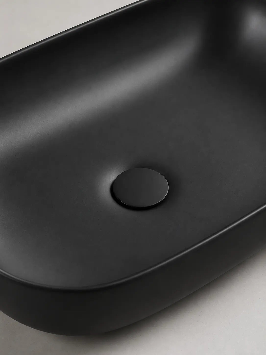 BBbidet 2635 matte black countertop basin drain cover detail view