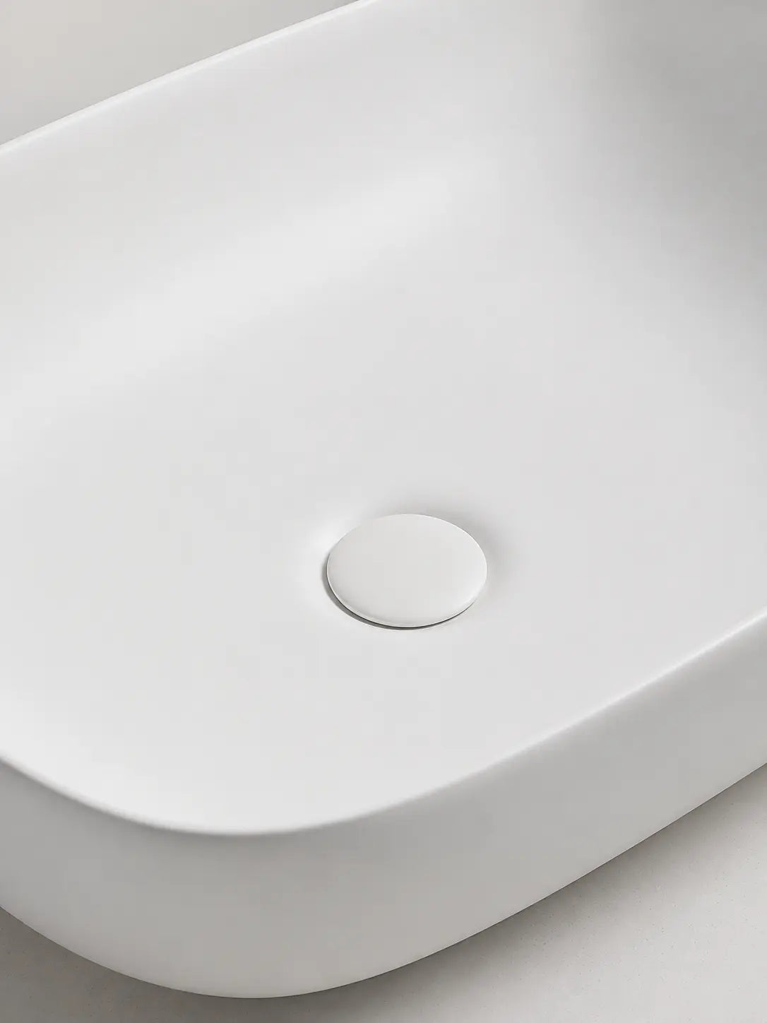 BBbidet 2635 matte white countertop basin drain cover detail view