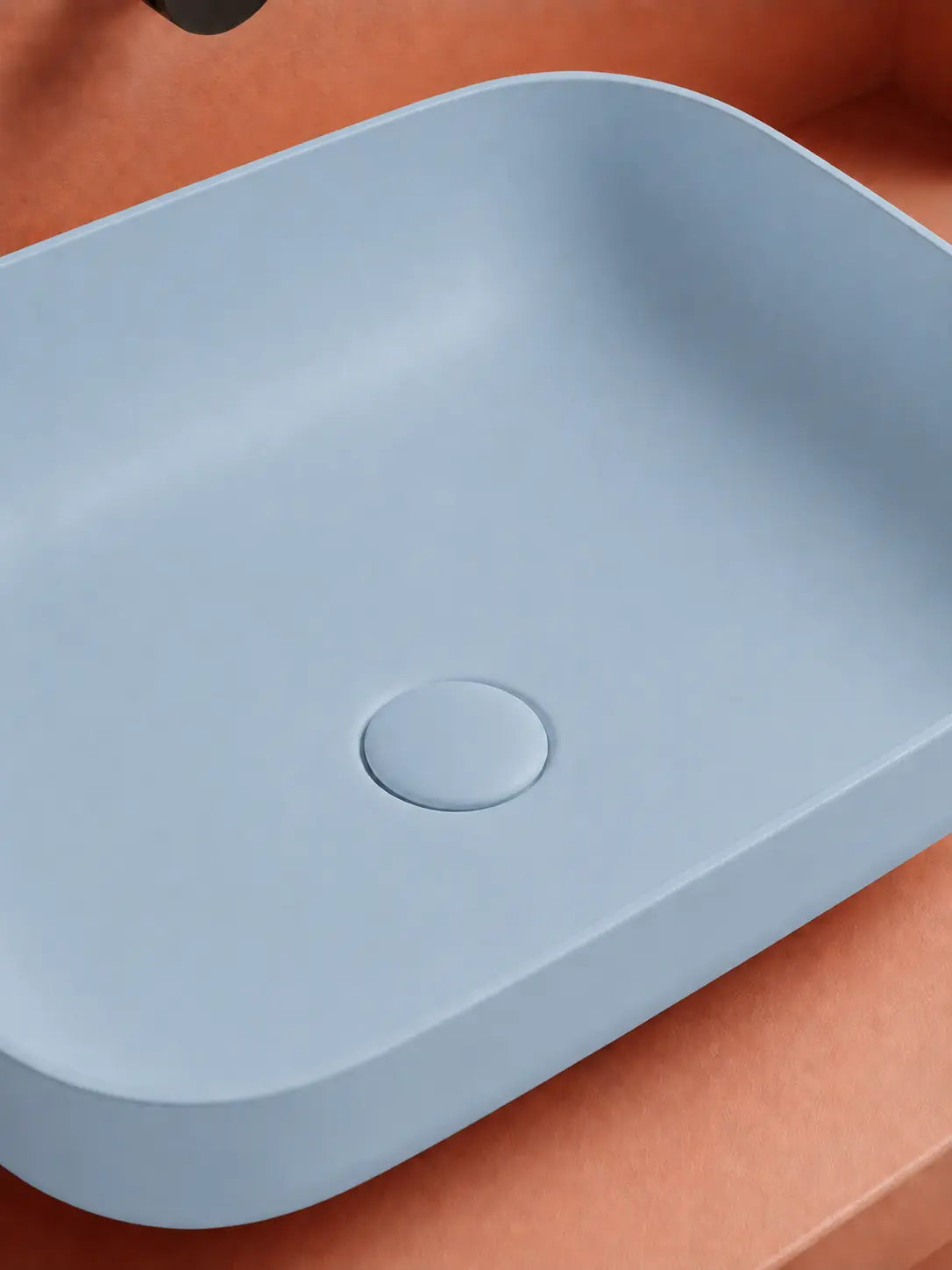 BBBIDET 2679 Matte Blue rounded rectangle countertop basin - ceramic drain cover detail