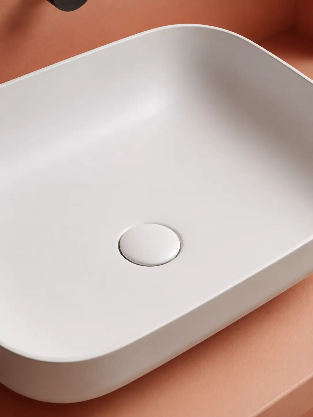 BBBIDET 2679 Matte White rounded rectangle countertop basin - ceramic drain cover detail