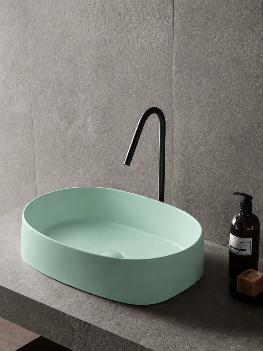 BBbidet 2691MG matte green oval countertop basin — hero bathroom scene
