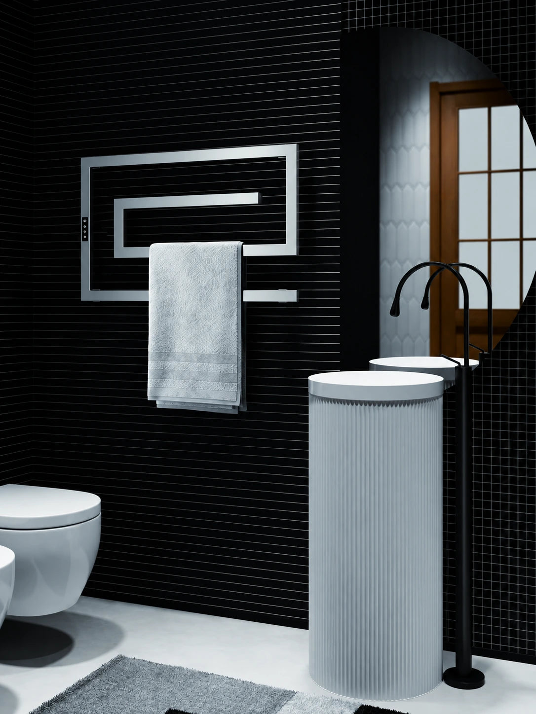 AL101 angular heated towel rail beside a pedestal sink and round mirror