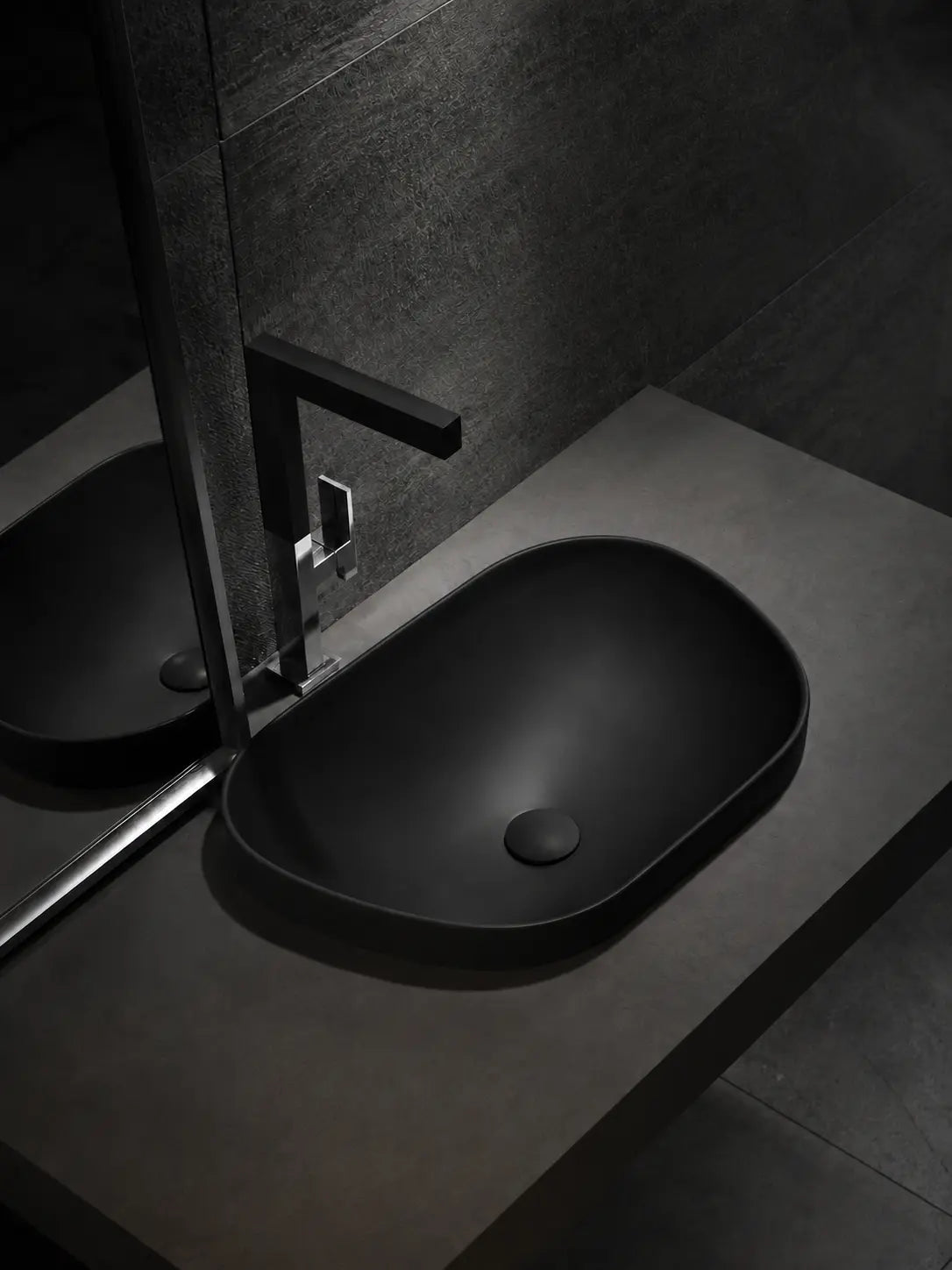 BBbidet V4 matte black semi-recessed basin in a dark modern bathroom