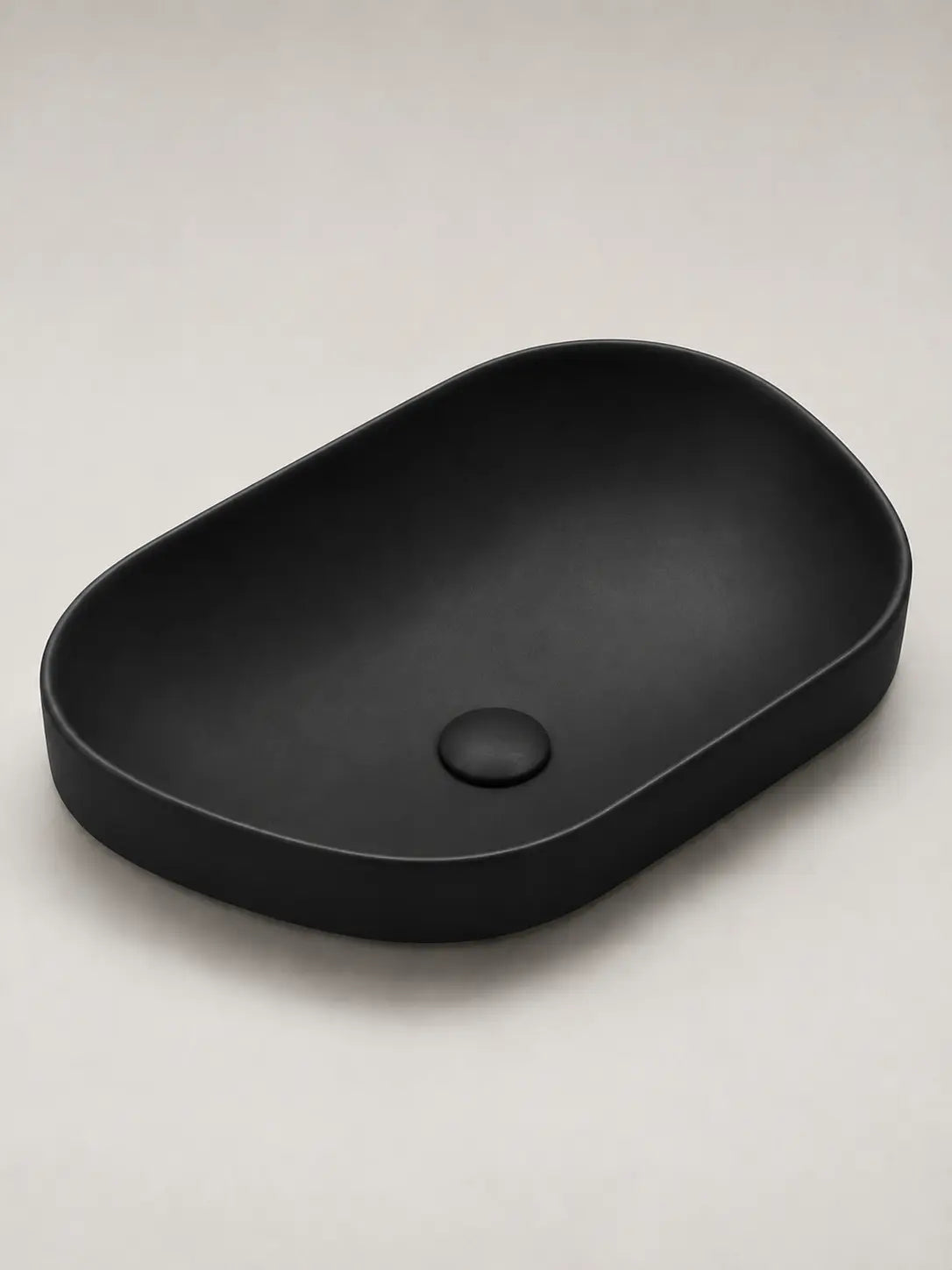 BBbidet V4 matte black semi-recessed basin on a clean studio background