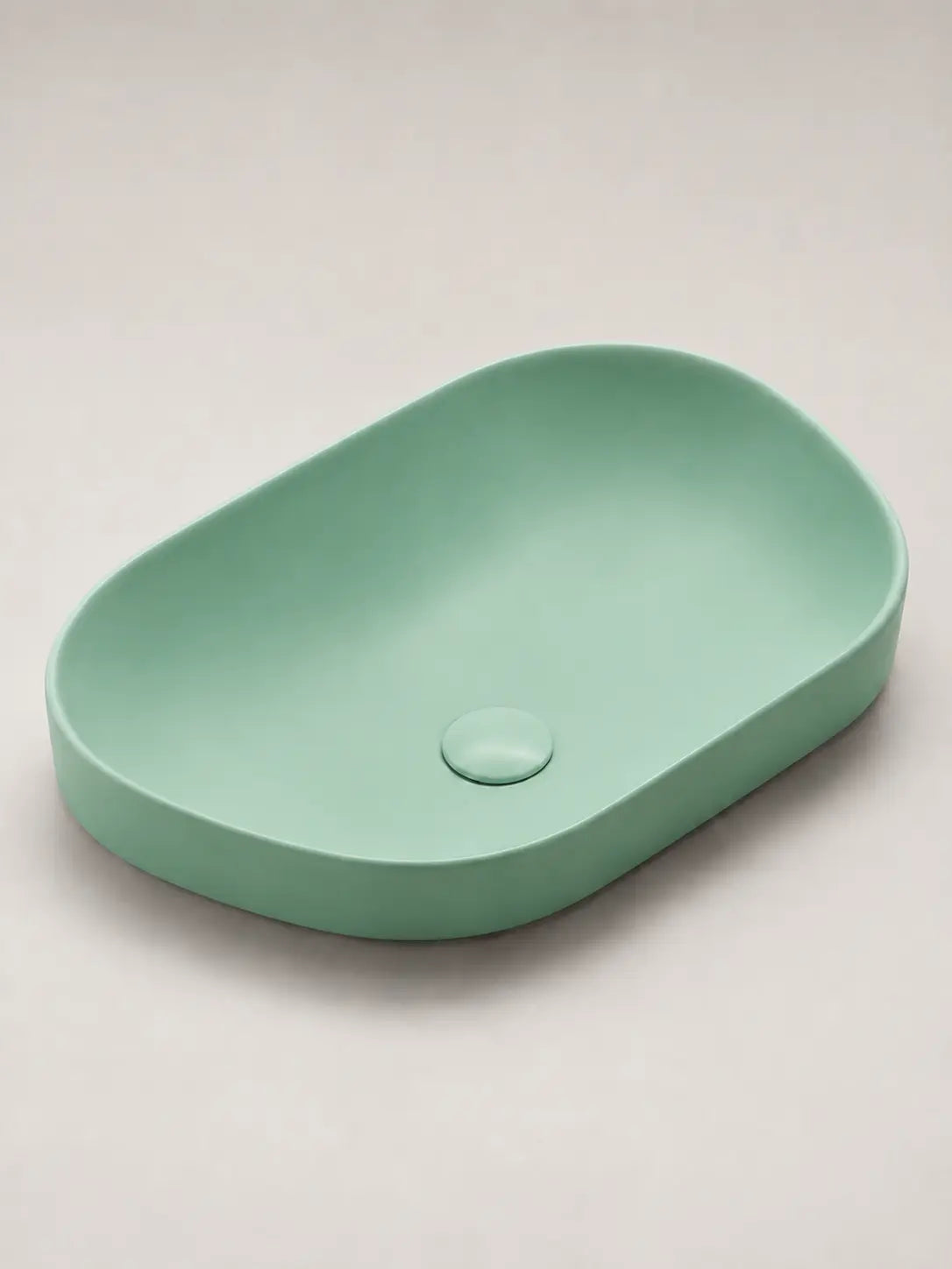 BBbidet V4 matte green semi-recessed basin on a clean studio background