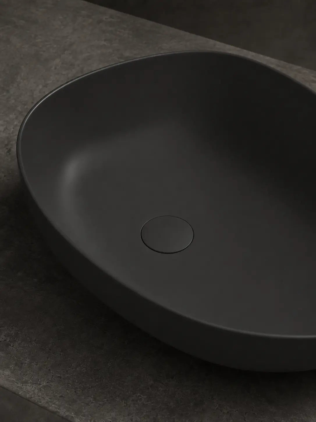Close-up of the smooth matte black bowl surface on the BBbidet V5 basin