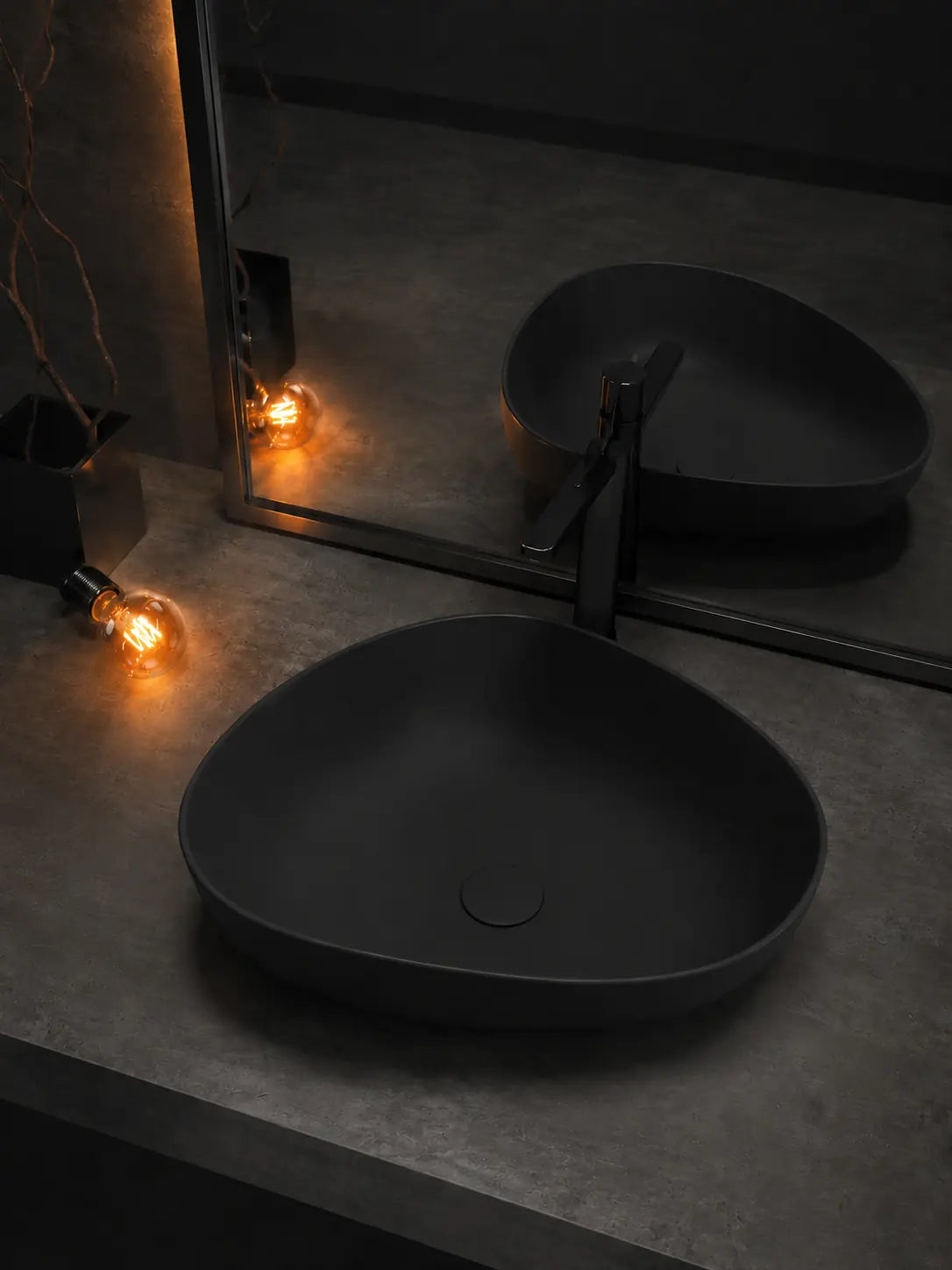 BBbidet V5MB matte black ceramic countertop basin beside a mirror and black faucet