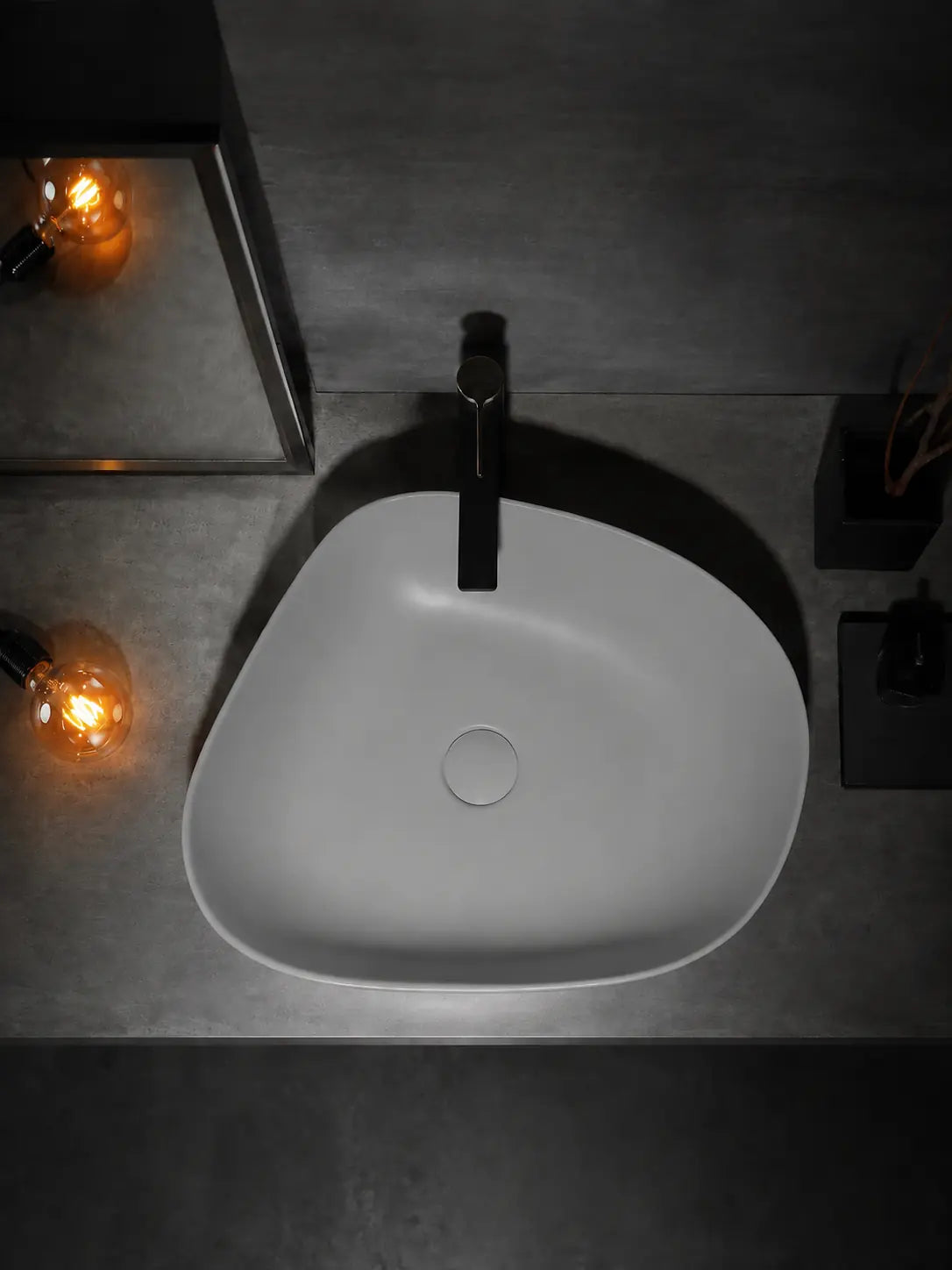 BBbidet V5 matte gray asymmetric countertop basin in a dark bathroom vanity setting
