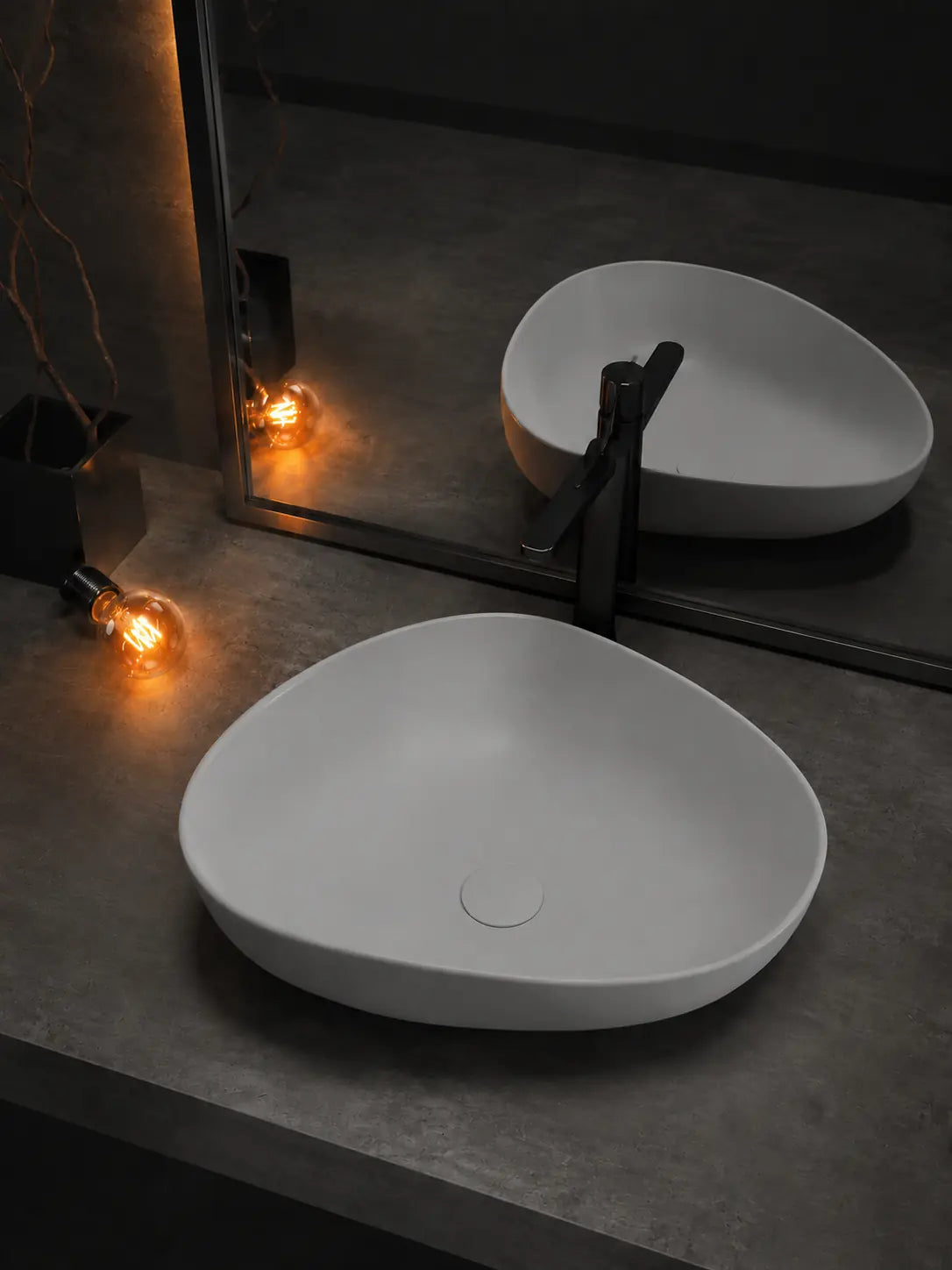 BBbidet V5MGR matte gray ceramic countertop basin beside a mirror and black faucet