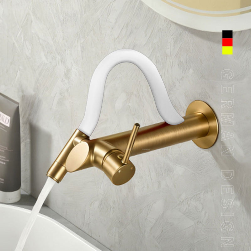 German design wall-mounted bathroom faucet in premium brushed gold with a modern white flexible silicone neck, single lever handle, flowing water into a white basin