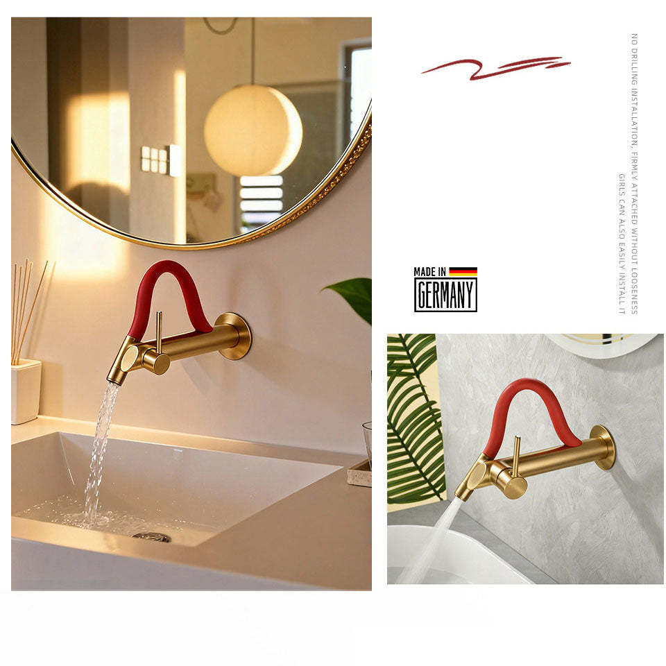 Product marketing collage for a brushed gold wall-mounted bathroom faucet with a red neck, showcasing a cozy lifestyle bathroom setting with a round mirror, water flowing into a basin, and a "Made in Germany" quality seal.