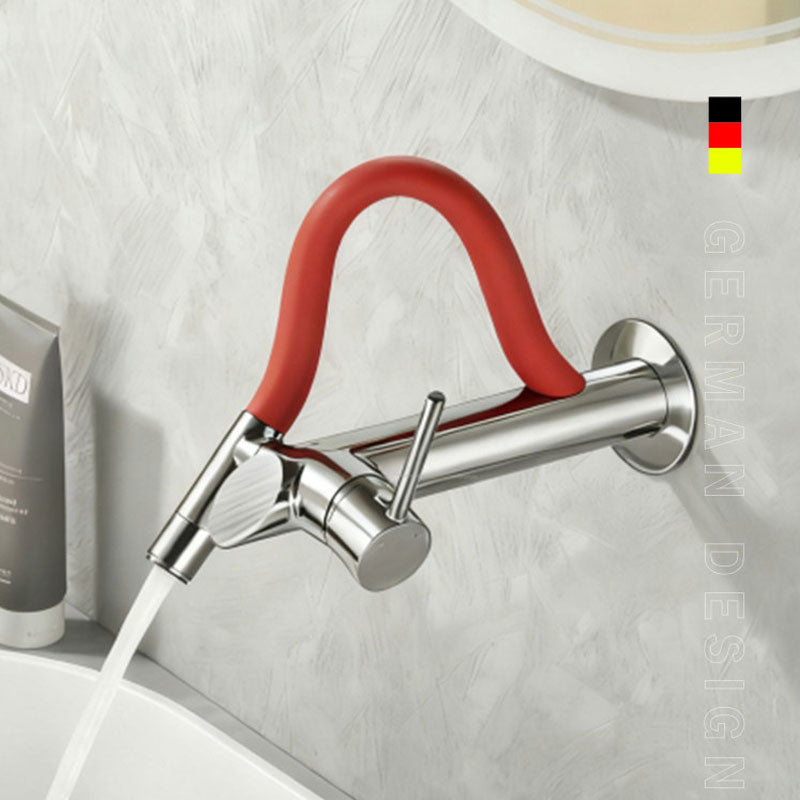 German design wall-mounted bathroom faucet in polished chrome with a vibrant red flexible silicone neck, single lever handle, running water into a white basin.