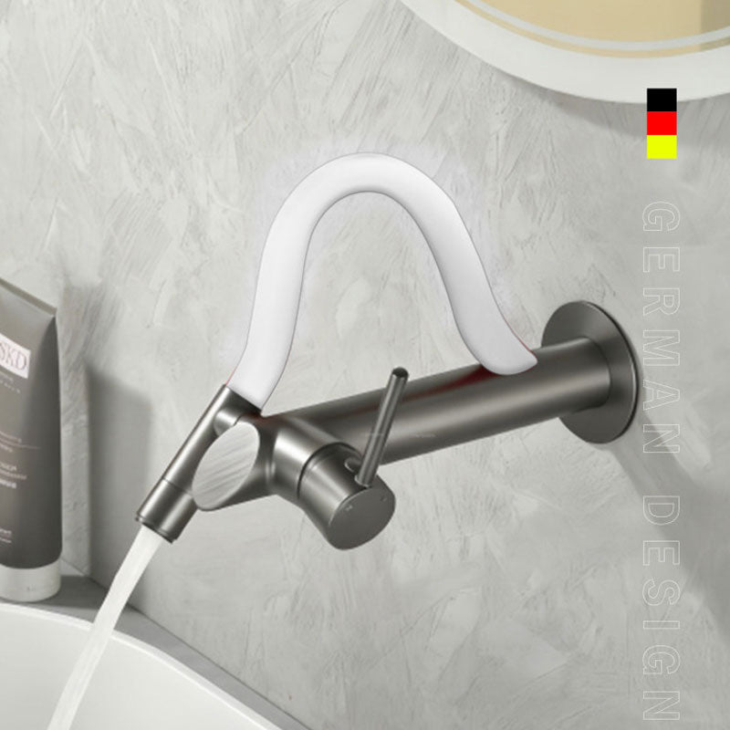German design wall-mounted bathroom faucet in brushed gunmetal grey featuring a modern white flexible silicone neck, single lever handle, flowing water into a white basin.