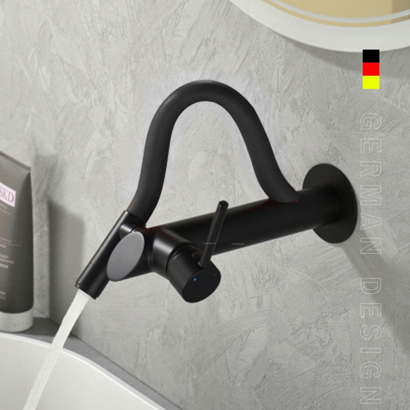 German design wall-mounted bathroom faucet in a sleek all-black finish with a matte black flexible silicone neck, single lever handle, flowing water into a white basin.