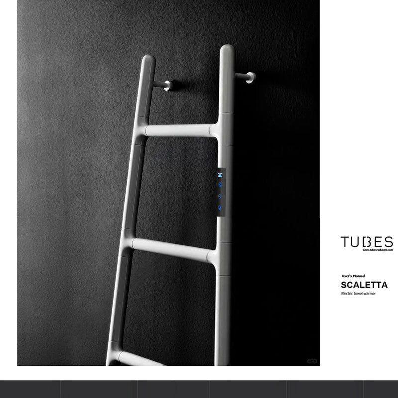 The official User's Manual cover for the TUBES SCALETTA electric towel warmer, showcasing a studio close-up of the silver ladder frame with its top wall-anchored supports and a glowing smart digital interface against a dark background.